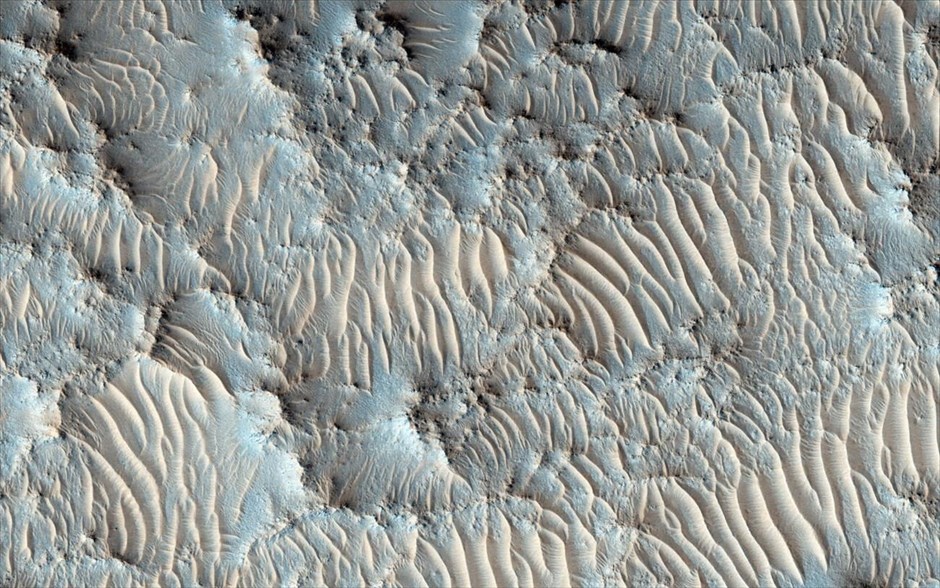 Mars Reconnaissance Orbiter: 10 χρόνια σε τροχιά γύρω από τον Άρη. Πιθανό σημείο προσεδάφισης για μελλοντικές αποστολές.