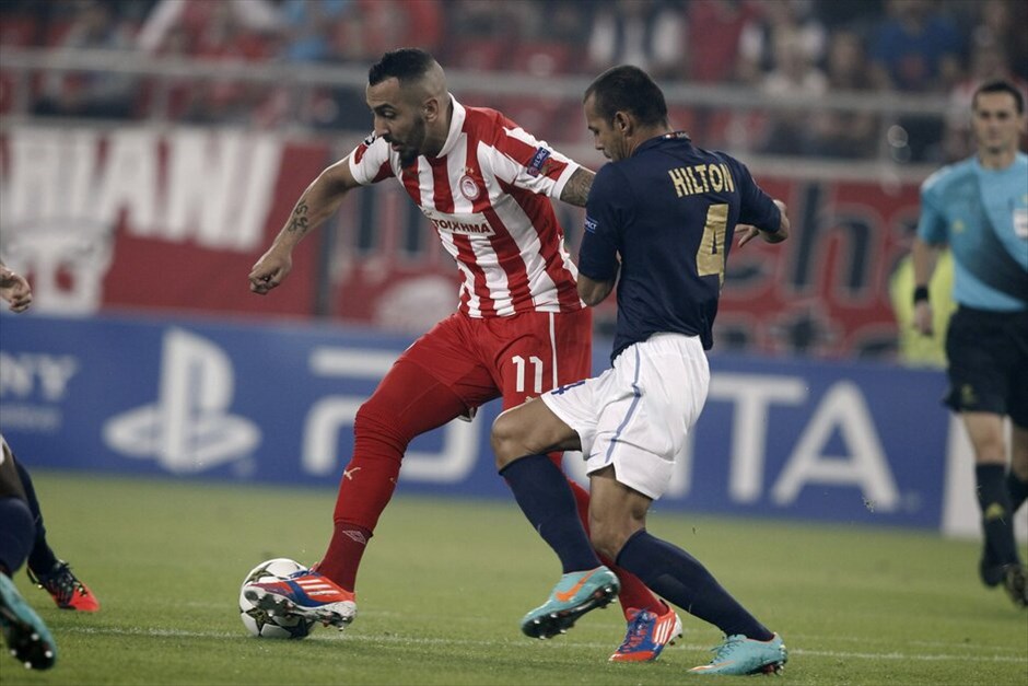 Champions League: Ολυμπιακός - Μονπελιέ 3-1 #7. Ο Κώστας Μήτρογλου δέχεται το μαρκάρισμα του Ιλτον.