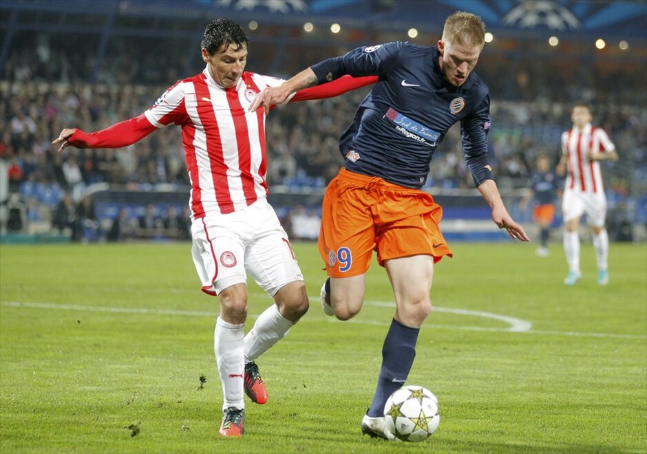 Champions League: Μονπελιέ - Ολυμπιακός 1-2 #22. Ο Πάολο Κοντρέρας μαρκάρει τον Γκαετάν Σαρμπονιέ.