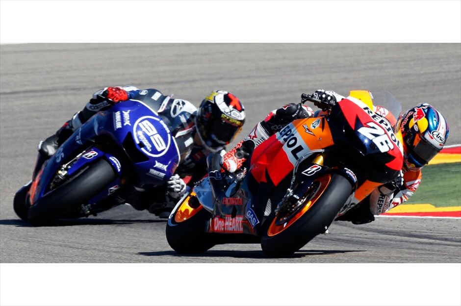 MotoGP: 14ος γύρος  #7. Στον έβδομο γύρο όμως ο αναβάτης της Repsol Honda προσπέρασε τον συμπατριώτη του και κράτησε την πρώτη θέση μέχρι το τέλος. REUTERS/GUSTAU NACARINO