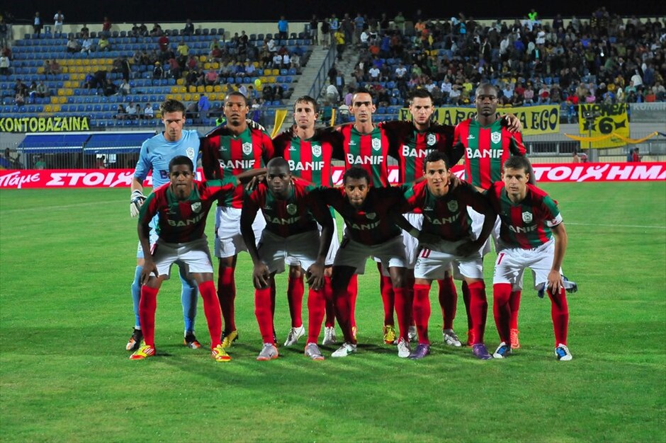 Europa League: Στιγμιότυπα από τον αγώνα Αστέρας Τρίπολης - Μαριτίμο #12. Ο Αστέρας Τρίπολης αναδείχθηκε ισόπαλος 1-1 με την Μαρίτιμο στον πρώτο αγώνα του Γ΄ προκριματικού γύρου του Γιουρόπα Λιγκ και δυσκολεύει αφάνταστα η υπόθεση πρόκριση στα πλέι οφ της διοργάνωσης. Η ομάδα της Αρκαδίας ήταν αρκετά καλή στο μεγαλύτερο διάστημα του αγώνα, ωστόσο, «προδόθηκε» από ένα στιγμιαίο λάθος της άμυνας κι έτσι σε μία εβδομάδα στην Πορτογαλία (9/08) θα πρέπει να πετύχει οπωσδήποτε γκολ και να μην χάσει, προκειμένου να βρεθεί στην κλήρωση της φάσης των πλέι οφ.