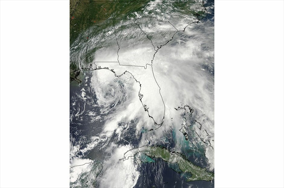 ΗΠΑ: Σαρώνει τη Φλόριδα η τροπική καταιγίδα Ντέμπι #12. REUTERS/NASA AQUA