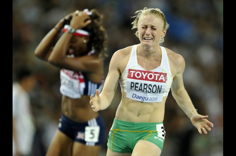 13ο Παγκόσμιο Πρωτάθλημα Στίβου #20. Η 26χρόνη Sally Pearson, από την Αυστραλία, πανηγυρίζει τη νίκη της στον τελικό των 100 μ. με εμπόδια.|
