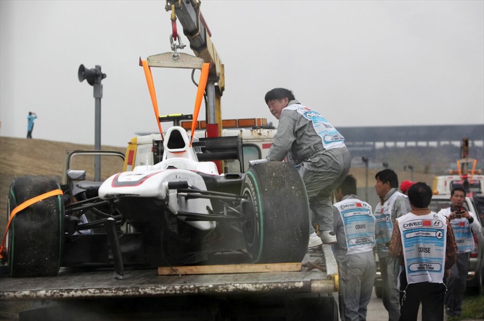F1: GP Κίνας #11. Η BMW Sauber του Κομπαγιάσι τέθηκε νωρίς εκτός αγώνα. HOW HWEE YOUNG/POOL