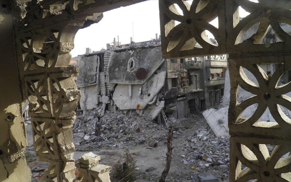 Πόλεις  - συντρίμμια στη Συρία. Κατεστραμμένα κτήρια στη Χομς. 7 Απριλίου 2013.