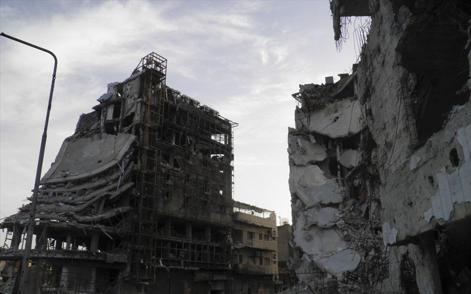 Πόλεις  - συντρίμμια στη Συρία. Κατεστραμμένα κτήρια στη Χομς. 7 Απριλίου 2013.