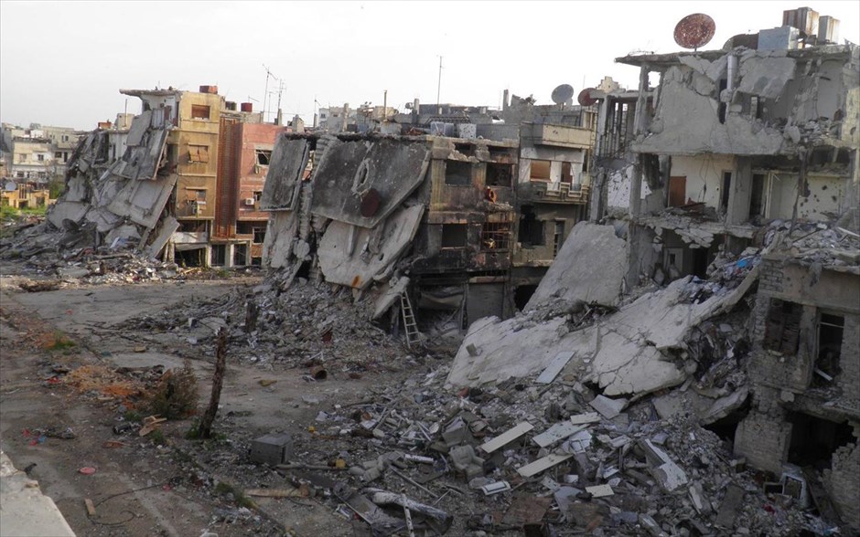 Πόλεις  - συντρίμμια στη Συρία. Κατεστραμμένα κτήρια στη Χομς. 8 Απριλίου 2013.