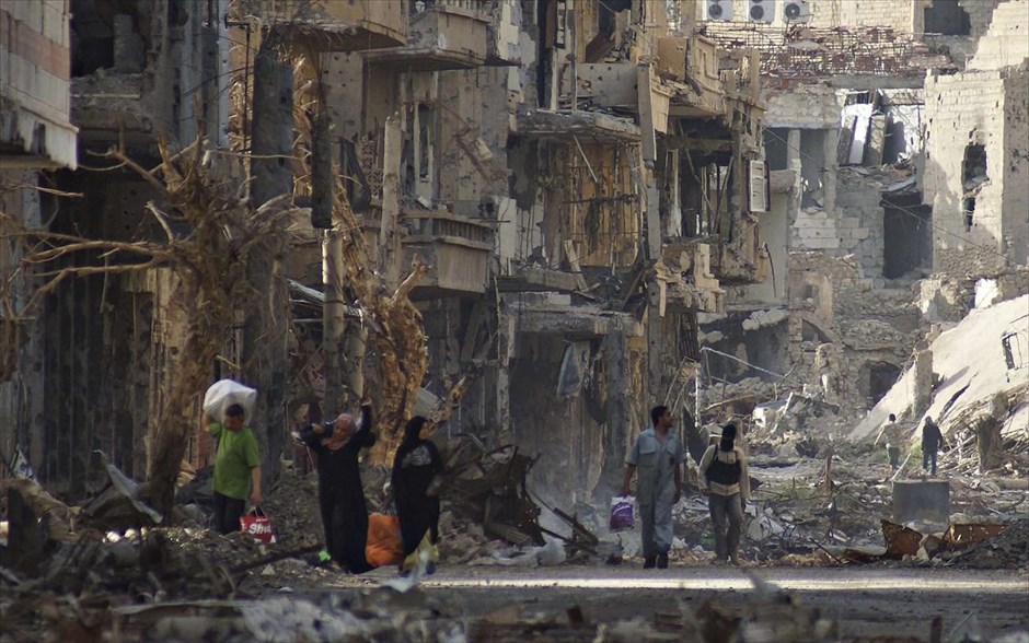 Πόλεις  - συντρίμμια στη Συρία. Η συνοικία Ντείρ Αλ-Ζορ στην Ανατολική Συρία. 7 Απριλίου 2013.