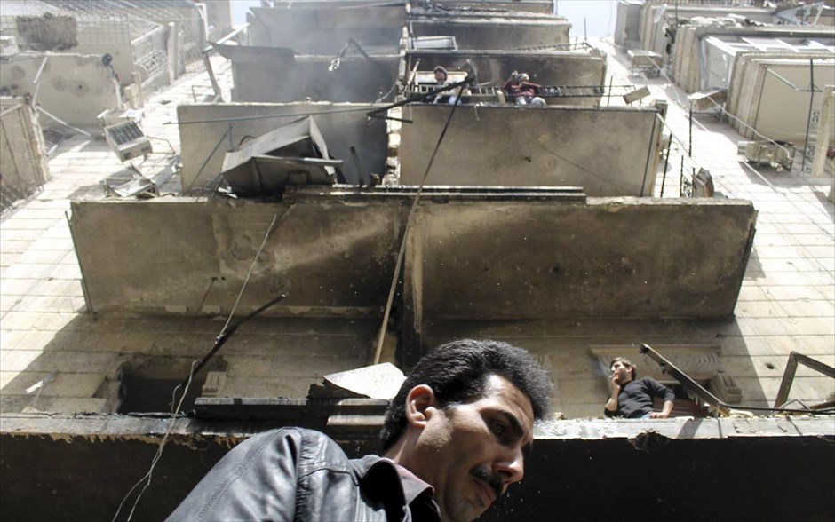 Πόλεις  - συντρίμμια στη Συρία. Κατεστραμμένο κτήριο στη συνοικία Αλ-Σουκάρι στο Χαλέπι. 7 Απριλίου 2013.