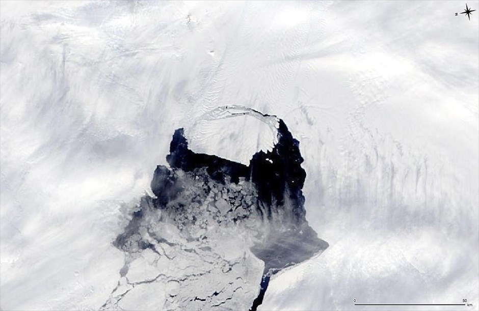 Ανταρκτική: Αποκολλήθηκε γιγαντιαίο παγόβουνο . Φωτογραφία από τον δέκτη MODIS, που βρίσκεται στον δορυφόρο Aqua της NASA και λήφθηκε στις 10 Νοεμβρίου, απεικονίζει το τεράστιο παγόβουνο που αποκολλήθηκε από τον παγετώνα του Πάιν Άιλαντ στην Ανταρκτική. Το παγόβουνο υπολογίζεται ότι έχει έκταση περίπου 700 τετραγωνικών χιλιομέτρων -περίπου το μέγεθος της Σιγκαπούρης. Μία ομάδα ερευνητών από τα πανεπιστήμια του Σαουθάμπτον και του Σέφιλντ πρόκειται να το παρακολουθήσουν στενά, σε μια προσπάθεια να προβλέψουν την πορεία του.