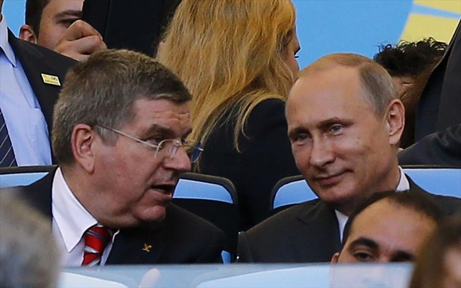 Μουντιάλ - Γερμανία - Αργεντινή. Ο Ρώσος πρόεδρος Βλαντιμίρ Πούτιν και ο πρόεδρος της Διεθνούς Ολυμπιακής Επιτροπής Τόμας Μπαχ παρακολουθούν τον αγώνα.