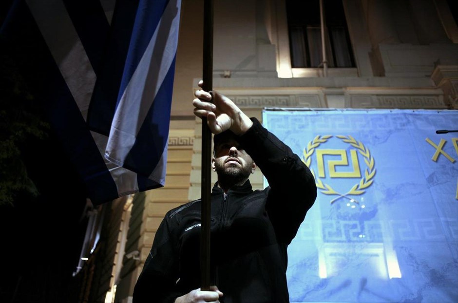 Συγκέντρωση των μελών της Χρυσής Αυγής για την επέτειο των Ιμίων. Συγκέντρωση της Χρυσής Αυγής μπροστά από το μνημείο των Ιμίων, στην πλατεία Ρηγίλλης για τη μνήμη των τριών στελεχών του Πολεμικού Ναυτικού που έχασαν τη ζωή τους στα Ίμια.