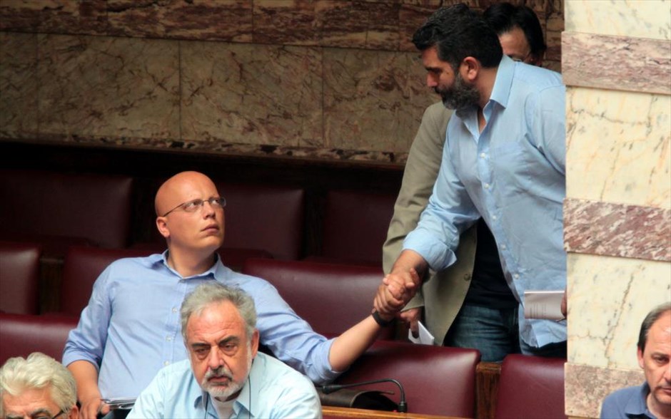 Κοδέλας - Σταθάς - Συζήτηση του ν/σ με τα προαπαιτούμενα στις Επιτροπές της Βουλής. Ο Δημήτρης Κοδέλας (αριστερά) και ο Γιάννης Σταθάς. Ο βουλευτής Αργολίδας του ΣΥΡΙΖΑ κ. Κοδέλας, με ανάρτησή του στο προσωπικό του ιστολόγιο τη Δευτέρα, ανέφερε ότι θα επιστρέψει «στην κανονική του ζωή», αλλά μέχρι τότε θα ψηφίζει «“όχι” σε ό,τι μετατρέπει την χώρα σε ειδική ζώνη φτώχειας και λεηλασίας».