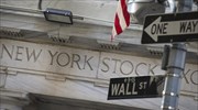 Στάση αναμονής και νευρικότητα στη Wall Street