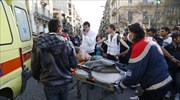 Two refugees threaten to commit suicide in central Athens square