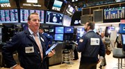 Μικρά κέρδη στη Wall Street, νέο ρεκόρ για Dow Jones