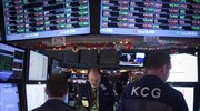 Ώθηση στη Wall Street από Fed και δολάριο