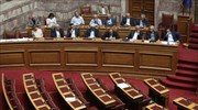 Delayed 2nd review rekindles snap election speculation; ruling SYRIZA