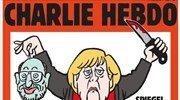 Με το κεφάλι Σουλτς στο χέρι η Μέρκελ στο Charlie Hebdo