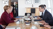 Reports: Mitsotakis tells German chancellor Greece