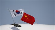 Διαμαρτυρία Σεούλ στον ΠΟΕ για τα αντίποινα της Κίνας