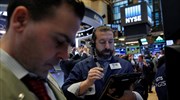 Wall Street: Μια «ανάσα» από τις 21.000 μονάδες ο Dow Jones
