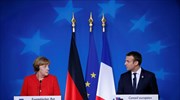 Macron, Merkel happy no Greek issue on the agenda of latest EU summit