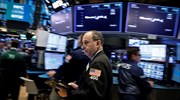 Μικτά πρόσημα στη Wall Street, νέο ρεκόρ για Dow Jones