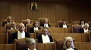 Reports: High court upholds 3rd memorandum-era law cutting social security benefits