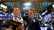 Wall Street: Απώλειες με το βλέμμα στο εμπόριο
