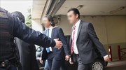 Turkish govt spox threatens abduction of eight officers who