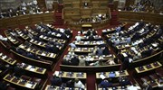 Greek govt officially tables draft budget with two options - with and without looming social security cuts