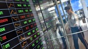 Market Beat: Βαρύ το κλίμα ώρες πριν από καθοριστική εξέλιξη στον πόλεμο των δασμών