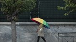 Γυναίκα στην βροχή