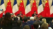 Εμανουέλ Μακρόν: «Να τελειώσει ο εμπορικός πόλεμος Κίνας - ΗΠΑ»