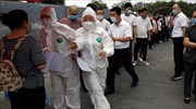 Κίνα: Μαζικά τεστ κορωνοϊού σε εργαζόμενους σε εταιρείες κούριερ