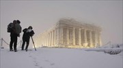 Acropolis shines amid a winter wonderland backdrop in Athens this week