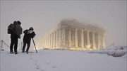 Acropolis shines amid a winter wonderland backdrop in Athens this week