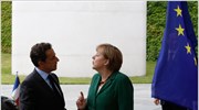 Mείωση του ελληνικού δημόσιου χρέους προβλέπει η γαλλογερμανική πρόταση