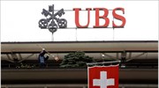 UBS: Πτώση 54% στα τριμηνιαία κέρδη