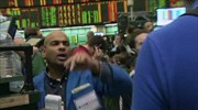 Συγκρατημένα κέρδη στη Wall Street