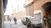 Σφοδρές συγκρούσεις σημειώνονταν ανάμεσα σε στρατιώτες πιστούς στο Σύρο πρόεδρο Μπασάρ αλ-Ασαντ ...