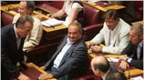 Ο πρώην πρωθυπουργός Κώστας Καραμανλής κατά τη διάρκεια της ονομαστικής ψηφοφορίας μετά ...