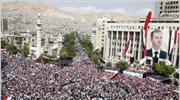 Δεκάδες χιλιάδες Σύροι διαδήλωσαν σήμερα στη Δαμασκό υπέρ του προέδρου Μπασάρ αλ ...