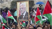 Χιλιάδες Παλαιστίνιοι υποδέχτηκαν τον πρόεδρο Μαχμούντ Αμπάς κατά την επιστροφή του από ...