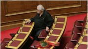Λουλούδια στο άδειο έδρανο του βουλευτή του ΚΚΕ Aγγελου Τζέκη που απεβίωσε ...