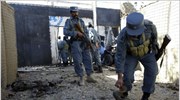 Τέσσερις Ταλιμπάν βομβιστές αυτοκτονίας, μεταμφιεσμένοι σε γυναίκες και αστυνομικούς, επιτέθηκαν το Σάββατο ...