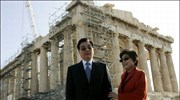 Στον αρχαιολογικό χώρο της Ακρόπολης ξεναγήθηκε σήμερα ο Πρόεδρος της Λαϊκής Δημοκρατίας ...