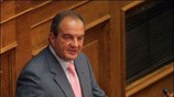 Ο πρωθυπουργός Κώστας Καραμανλής μιλάει από το βήμα της Ολομέλειας της Βουλής ...