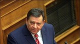 Ο πρόεδρος του ΛΑ.Ο.Σ Γιώργος Καρατζαφέρης μιλάει από το βήμα της Ολομέλειας ...